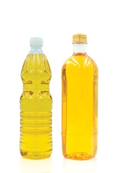 Vegetable oil cooking in plastic clear bottle with lid isolated on white background. photo