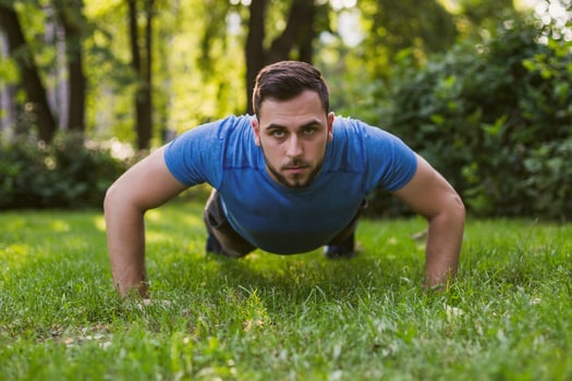 Handsome man practicing  in the park. photo