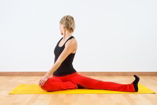 Woman exercising yoga photo