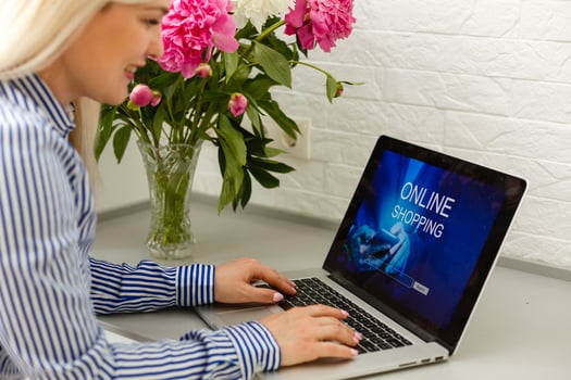 Cropped Image Of Businesswoman Using Laptop At Desk photo