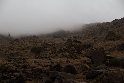 Beautiful foggy landscape with rocky mountain in Morocco. photo