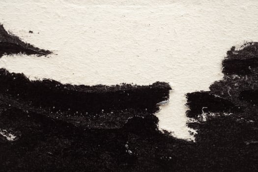 Old grunge ripped torn black paper poster surface texture background photo