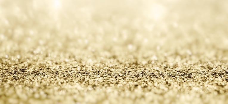 Abstract gold glitter sparkle with bokeh background photo