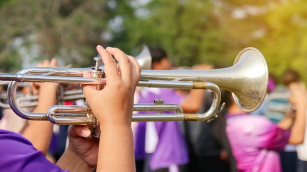 Music instrument is being played by hands photo