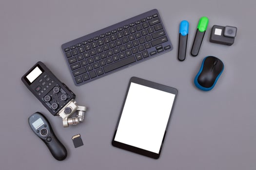 Top View of Video Blogger's Workplace. Digital Gadgets Lying on Grey Table Flat Lay photo