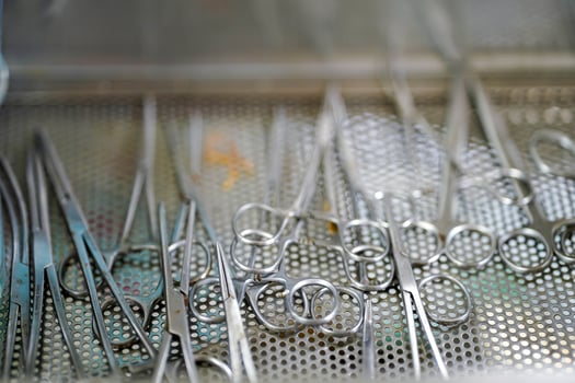 Closeup medical tools and scissors for dressing wounds of veterinary in clinic photo