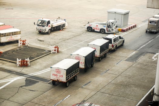 Bangkok City, Thailand, 2018 - Cargo service and airport baggage loader cart in Don Mueang International Airport. photo