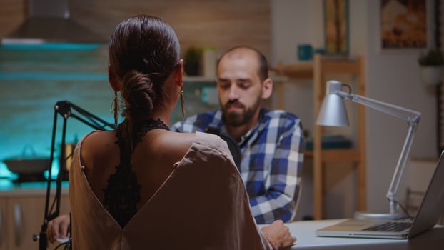 Man speaking with influencer in home studio wearing headphones and talking on micrphone. Creative online show Onair production internet broadcast host streaming live content, recording digital social media communication photo