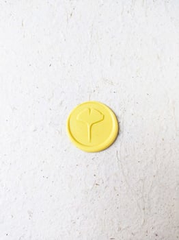 wax seal stamp on white paper background. Top view. Copy space. photo