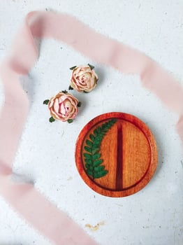 handmade wood and resin coaster for decoration on a white background photo