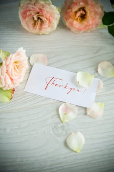 bouquet of beautiful orange roses on table photo