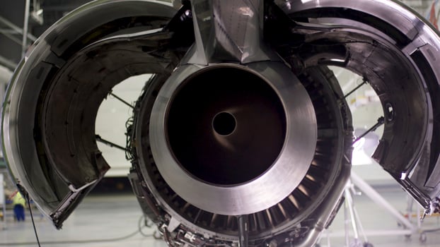 Engine of the airplane under heavy maintenance. Aircraft maintenance, dismantled plane engine. Chassis of the airplane under heavy maintenance photo