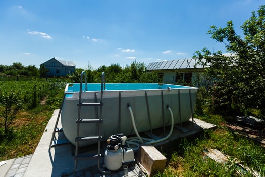Private swimming pool at summertime photo