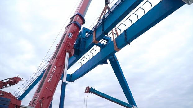 Moscow, Russia - September 2018. Gantry crane with hook for lifting. Clip. Construction site. Industrial plant. photo