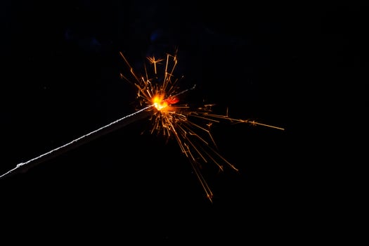 closeup view of burning sparkler photo
