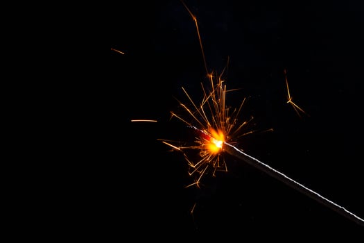 closeup view of burning sparkler photo