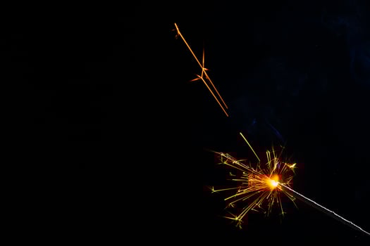 closeup view of burning sparkler photo