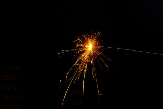 closeup view of burning sparkler photo