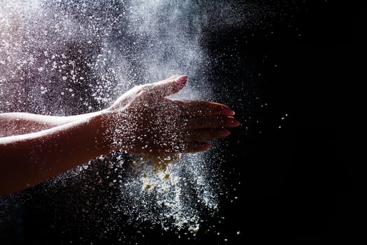Abstract design of white powder cloud isolated on black, dark background. Abstract design of white dust cloud. Particles cloud screen saver, wallpaper. photo