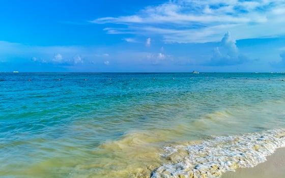 Tropical Caribbean beach clear turquoise water Playa del Carmen Mexico. photo