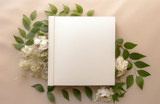 AI generated a white blank book surrounded by green leaves photo