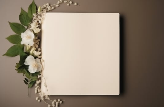 AI generated a white blank book surrounded by green leaves photo