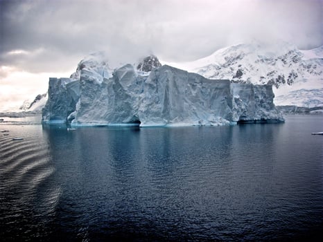 Landscape View of ice glacier in ocean photo