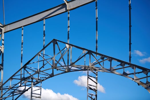 Frame of goods shed. Metal construction of railway building. Old abandoned steel warehouse for goods. photo