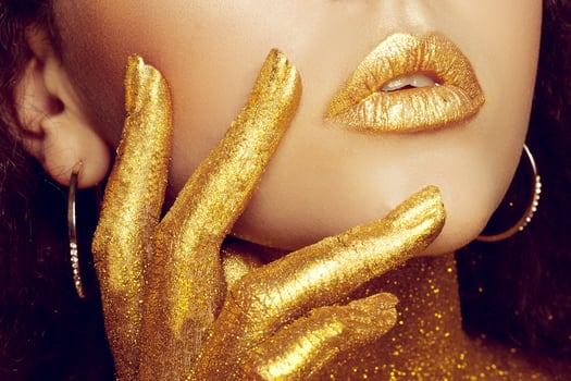 Magic Girl Portrait in Gold. Golden Makeup photo