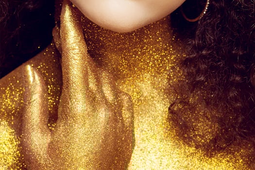 Magic Girl Portrait in Gold. Golden Makeup photo
