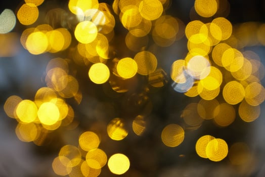 Gold light bokeh for holiday lights background or Christmas background photo