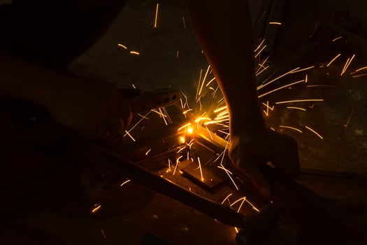 welding steel with sparks lighting photo