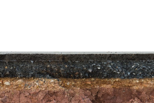 The layer of asphalt road with soil and rock. photo