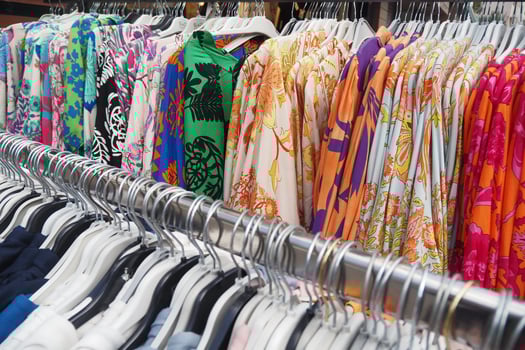 close up of many women cloths display for sale photo