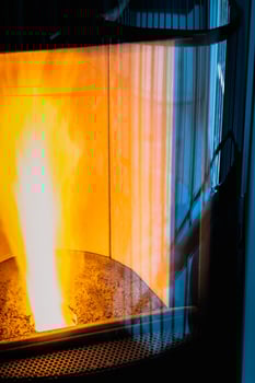 Hearth of a pellet stove, granules stove with flames photo