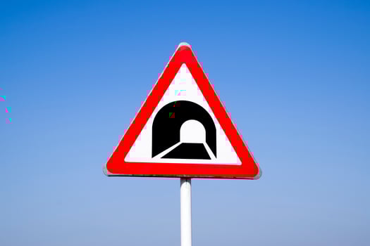 A road sign warning about the tunnel. photo
