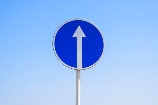 Traffic sign straight ahead. prescriptive sign. Sign on a blue sky background. photo