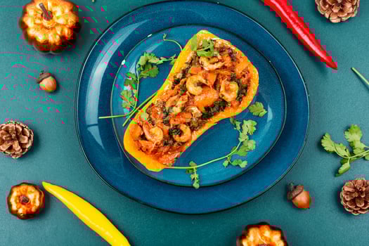 Pumpkin stuffed with vegetables and shrimp. photo