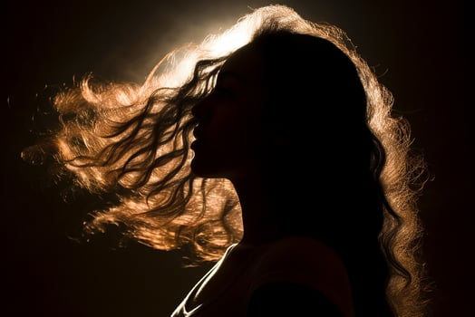 AI generated Silhouette of a female standing with long hair photo