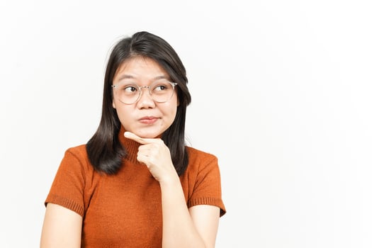 Thinking and Curious Face Of Beautiful Asian Woman Isolated On White Background photo