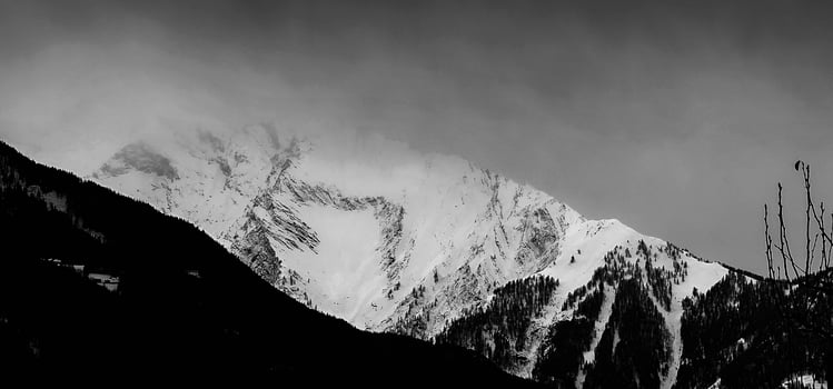 winter landscapes of the Aosta valley, the Alps mountain range in December 2023 at the beginning of the cold winter photo