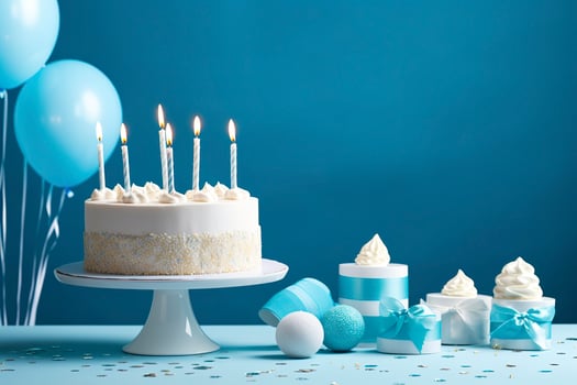 AI generated Birthday cake with candles and sweets on white table near blue wall. Generative AI photo