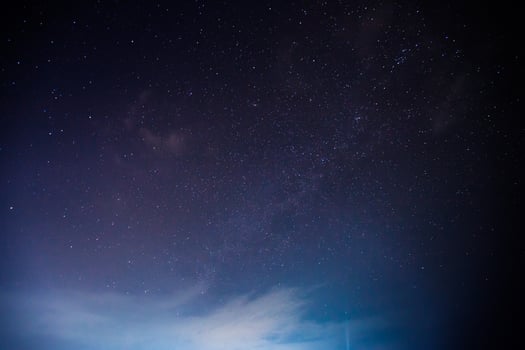star at nigh time againts sky with cloudy photo