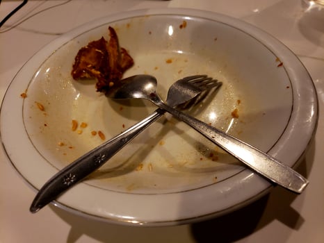 A dirty white plate photo