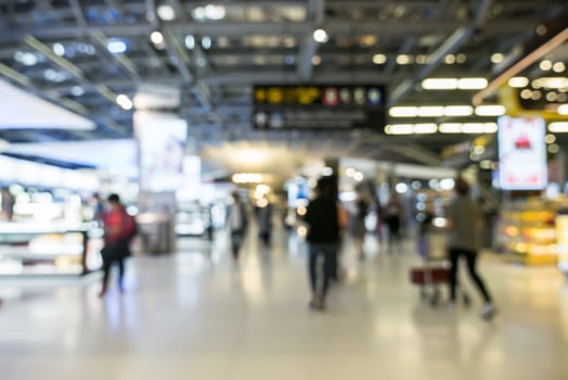 Blur of duty free shop in terminal building of airport photo