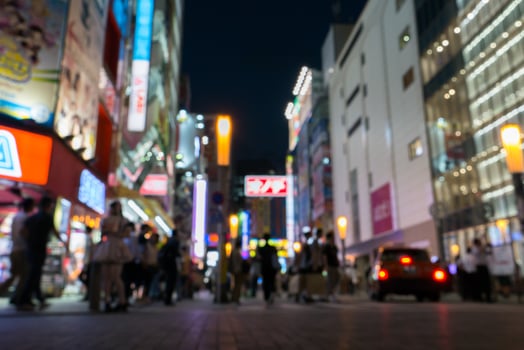 blur of colorful night sightseeing in city photo