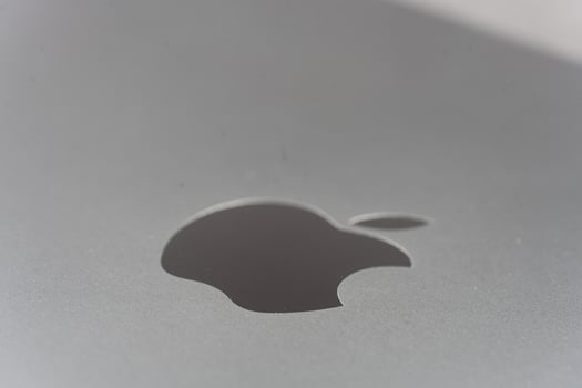 Bangkok, Thailand - December 16, 2023 Macbook logo on space black color on Apple MacBook Pro M3 photo