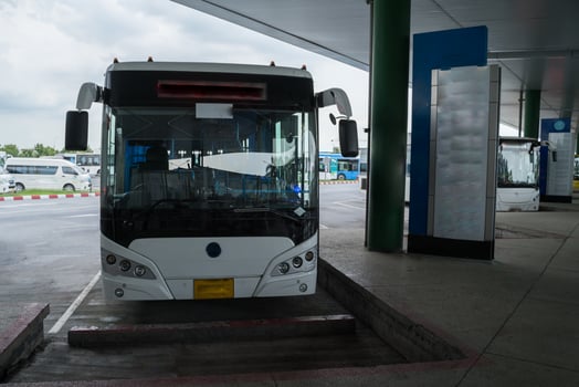 Bus stop at station in terminal photo