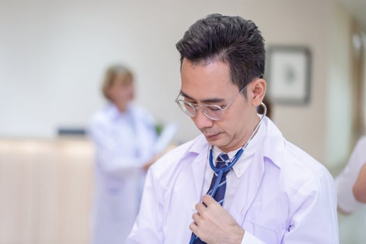 Doctor posing and smiling at hospital, Medical healthcare and doctor service, team of mixed-races doctors photo