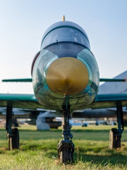 vintage military reconnaissance aircraft at the airport photo